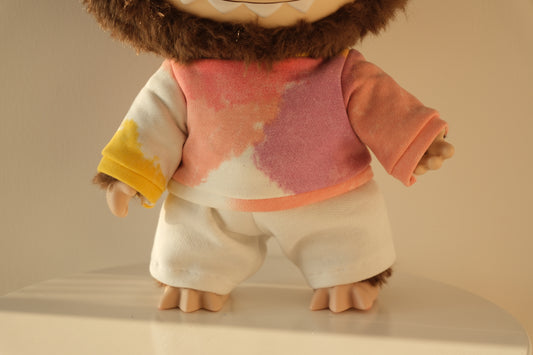 Close-up of the light-reflective gummy texture of the neon hoodie for the 38cm Labubu Vinyl Plush