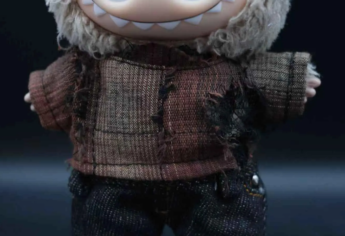 details of LABUBU plush doll wearing a wasteland punk t-shirt