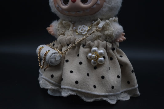 a close-up of Labubu Fairytale Princess dress outfit including headband, flower necklace and white dress