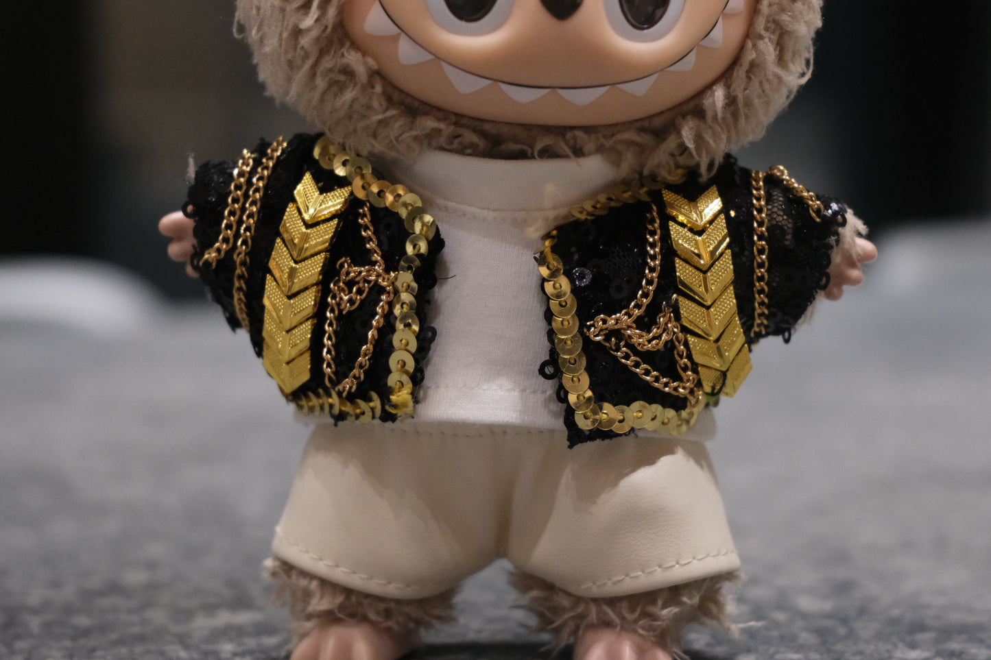 a close up of labubu ware kpop demon outfit
