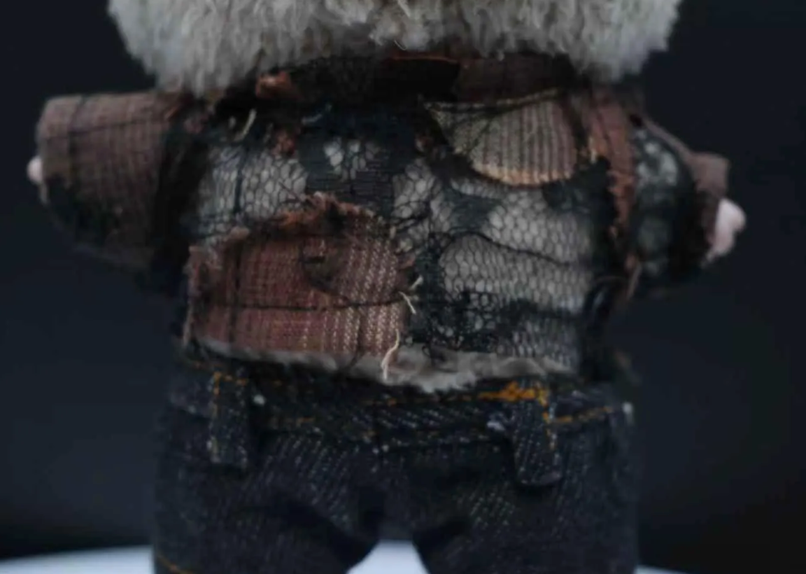 LABUBU plush doll wearing sunglasses and a wasteland punk t-shirt