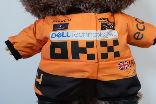 58cm Mega Zimomo wearing a McLaren F1 racing jumpsuit in orange and black