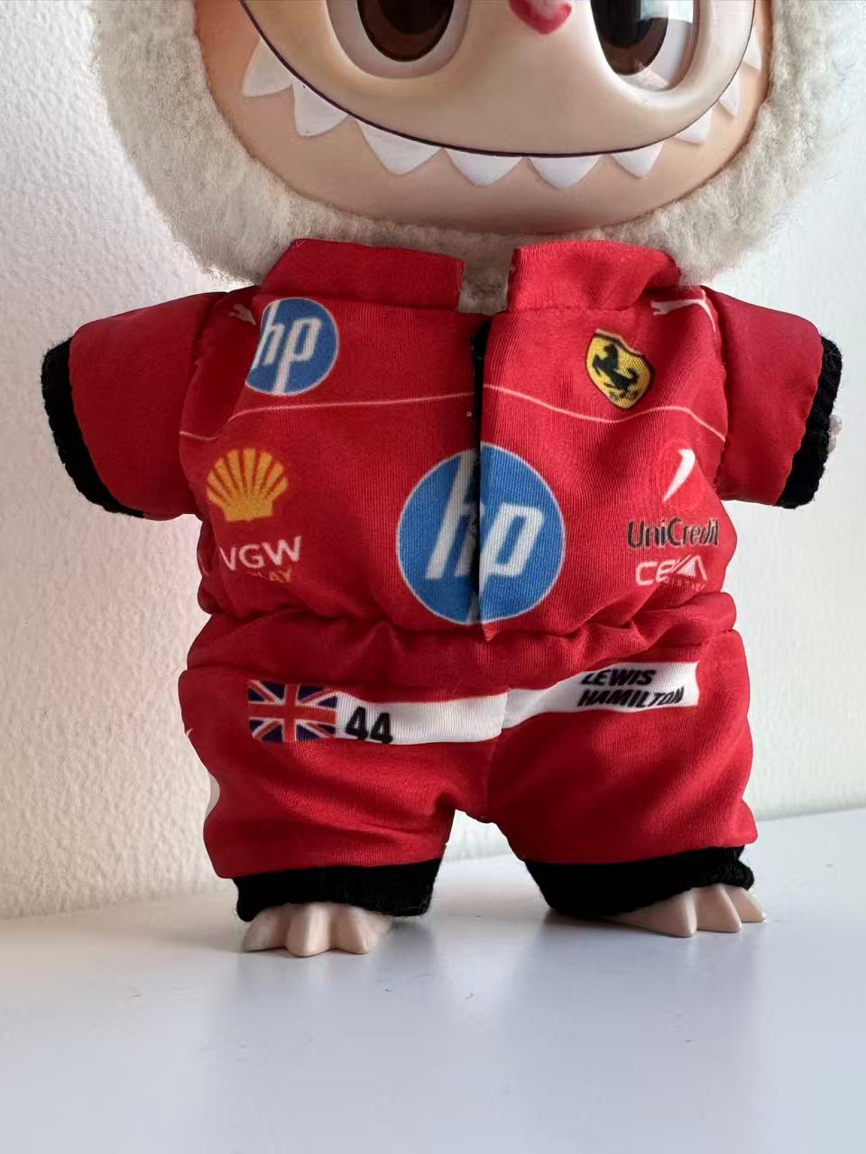 details of labubu F1 Ferrari jumpsuirt