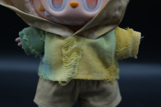 LABUBU plush doll wearing a distressed tie-dye hoodie, khaki pants