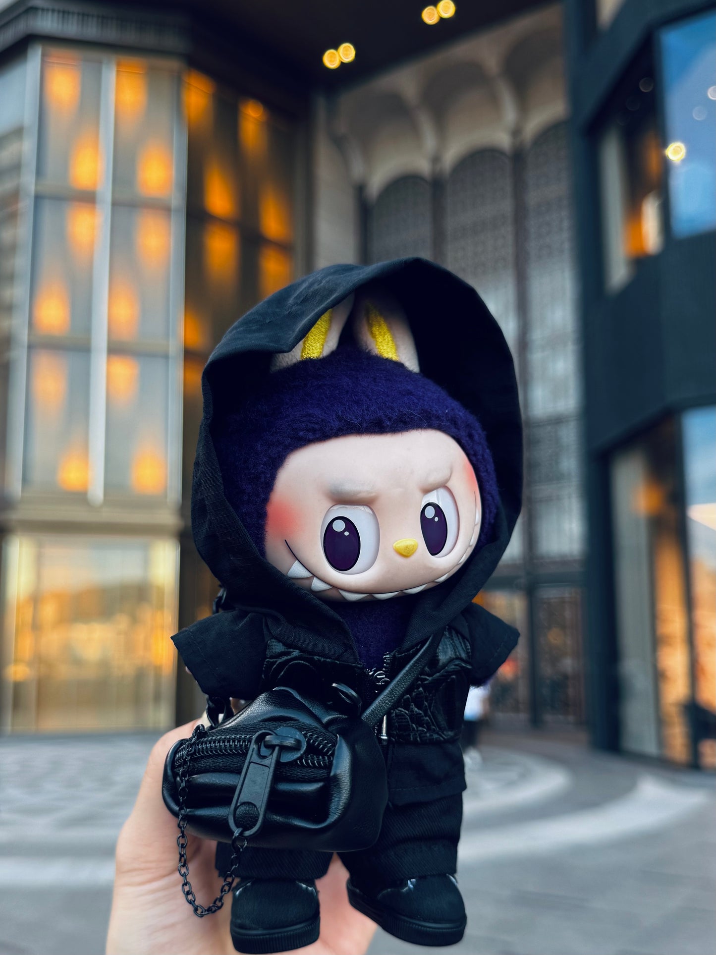 labubu wear a leather jacket outfit with a crossbody bag