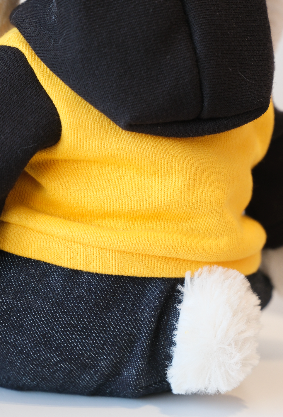 Close-up of the miniature soft fabric hoodie and hood detail on a Jellycat Bunny doll.