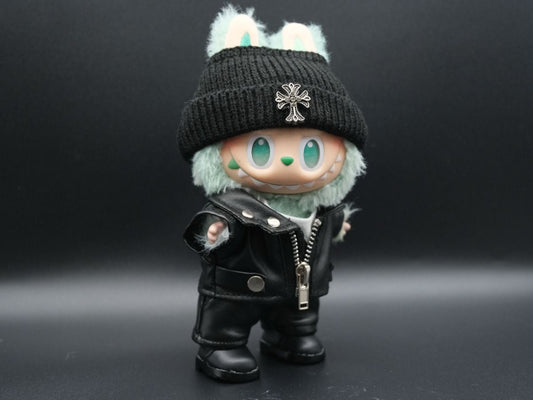 A Labubu figure wearing a black leather jacket, a white graphic t-shirt underneath, black leather pants, and black sneakers.