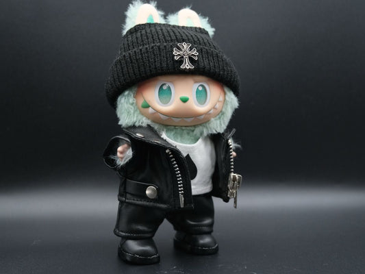 A Labubu figure wearing a black leather jacket, a white graphic t-shirt underneath, black leather pants, and black sneakers.