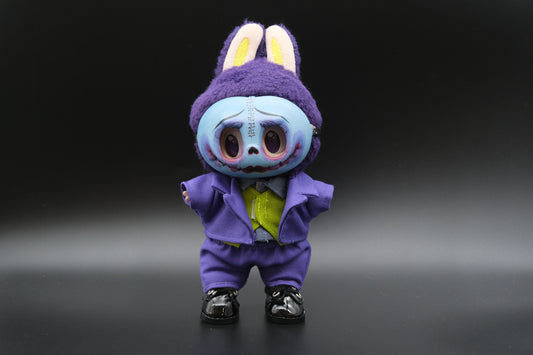 A Labubu figure wearing a 6-piece Halloween Joker costume, including a purple suit, green vest, and signature mask