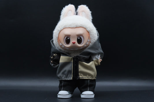 a Labubu figure wearing a functional windbreaker outfit, black pants and shoes
