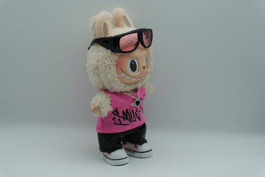 side view of labubu wear a sunglasses, pink vest and black leather pants and pink shoes