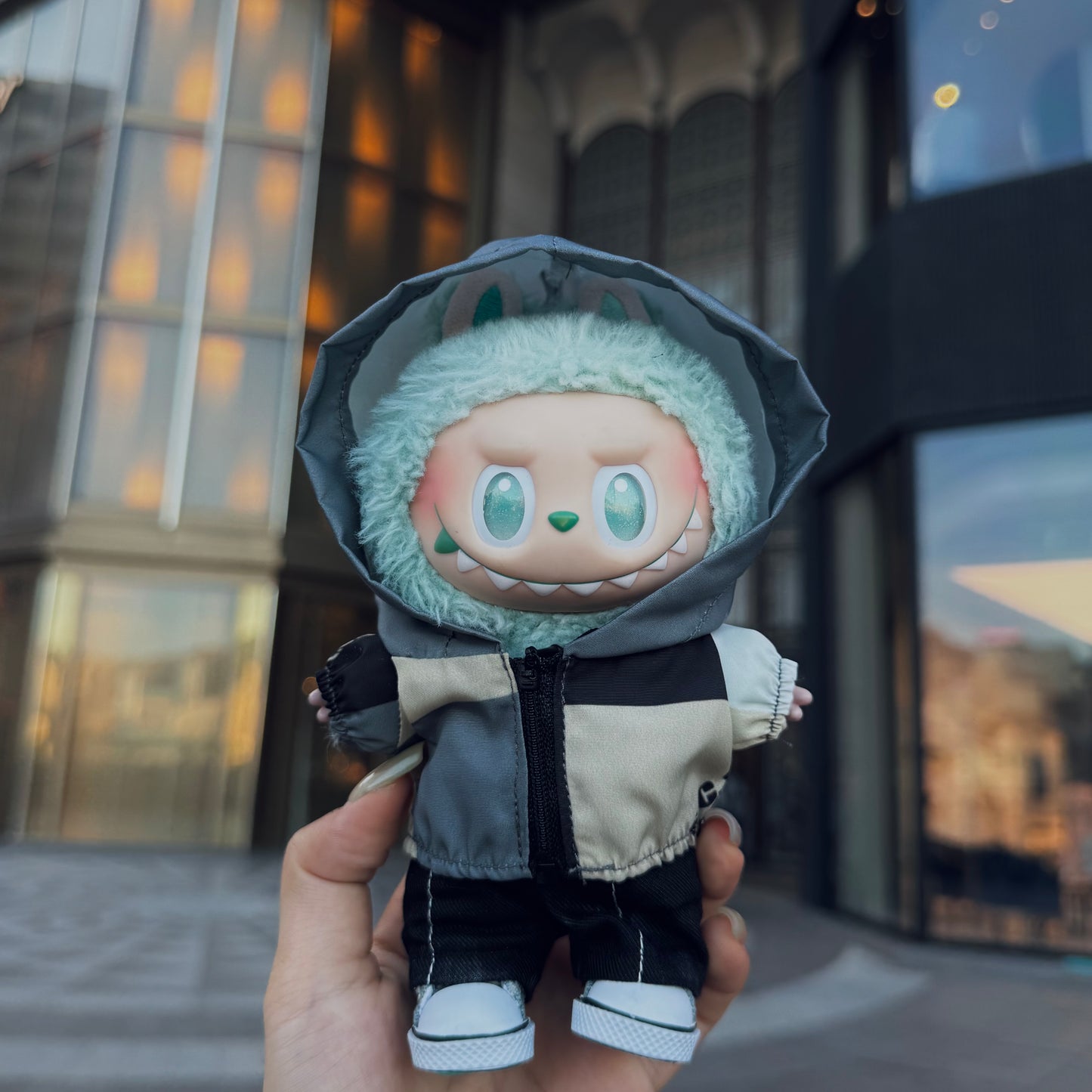 labubu wear Functional windbreaker, black pants and shoes