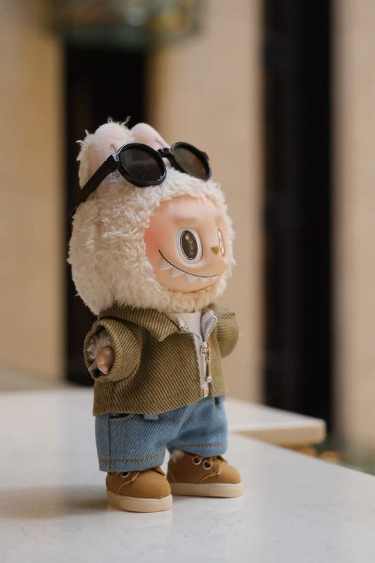A collectible figure wearing a 5-piece denim street style outfit, including a jacket, T-shirt, jeans, shoes, and sunglasses.