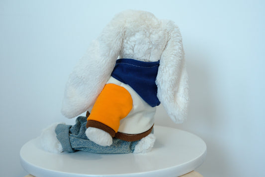 Jellycat Bashful Bunny plush wearing a 2-piece urban outfit with a gray hoodie and blue denim jeans.