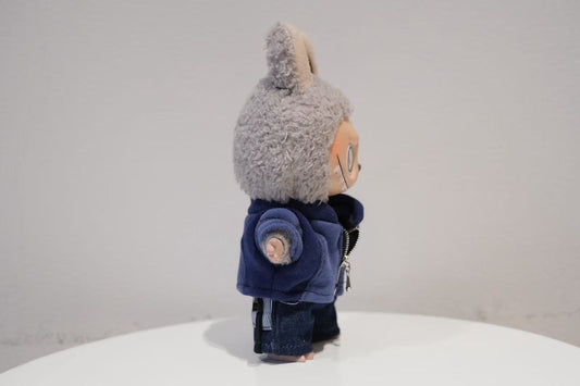 side view of Labubu figure wearing a 3-piece Zootopia Judy Hopps costume set, including a blue zip jacket and denim pants