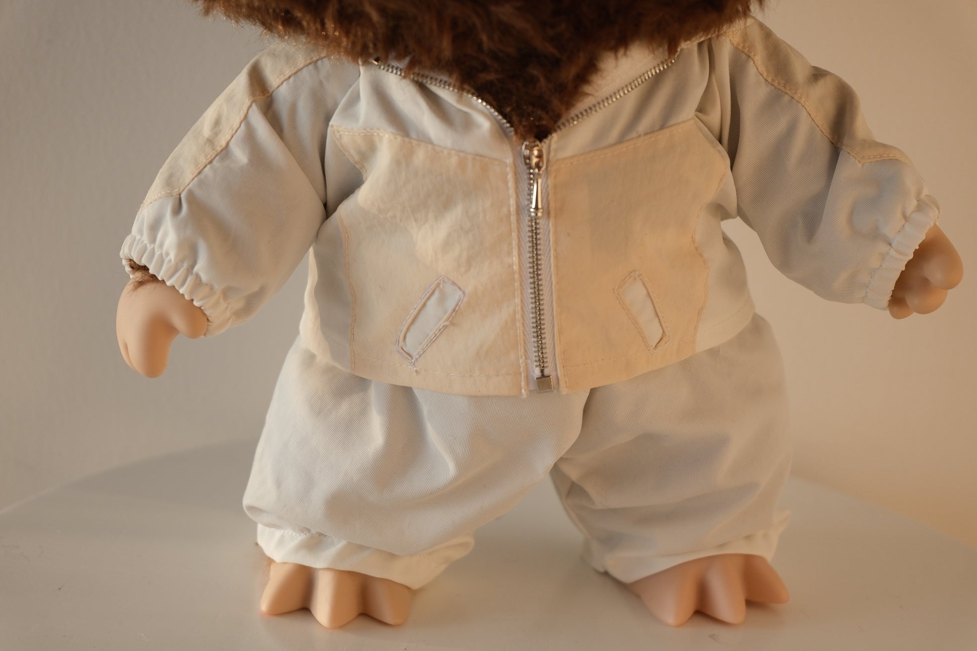 close-up of the blue sequins on the 38cm Labubu jacket, showing the light-reflective texture