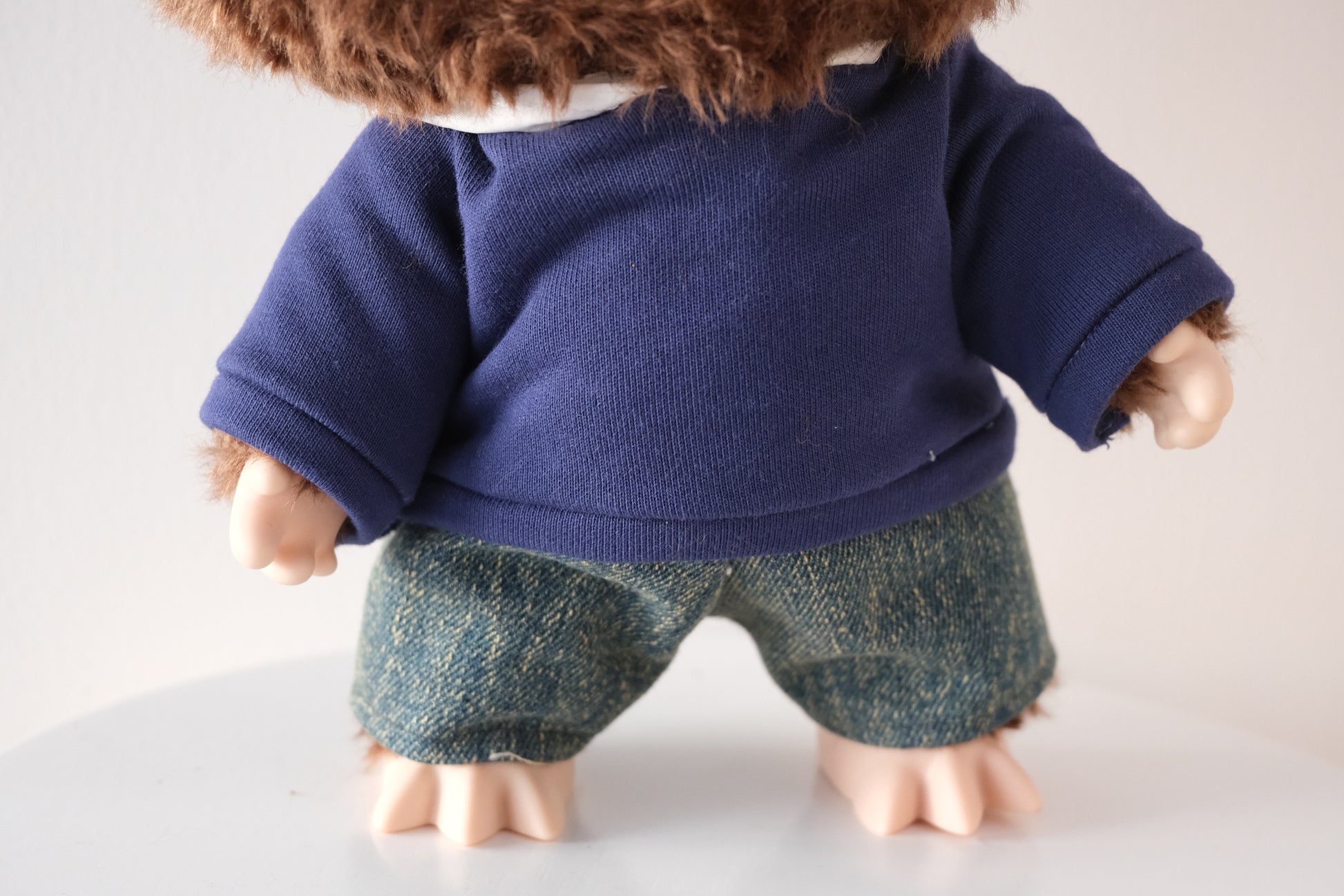 Detailed view of the denim pants for 38cm Labubu showing realistic stitching and relaxed urban fit