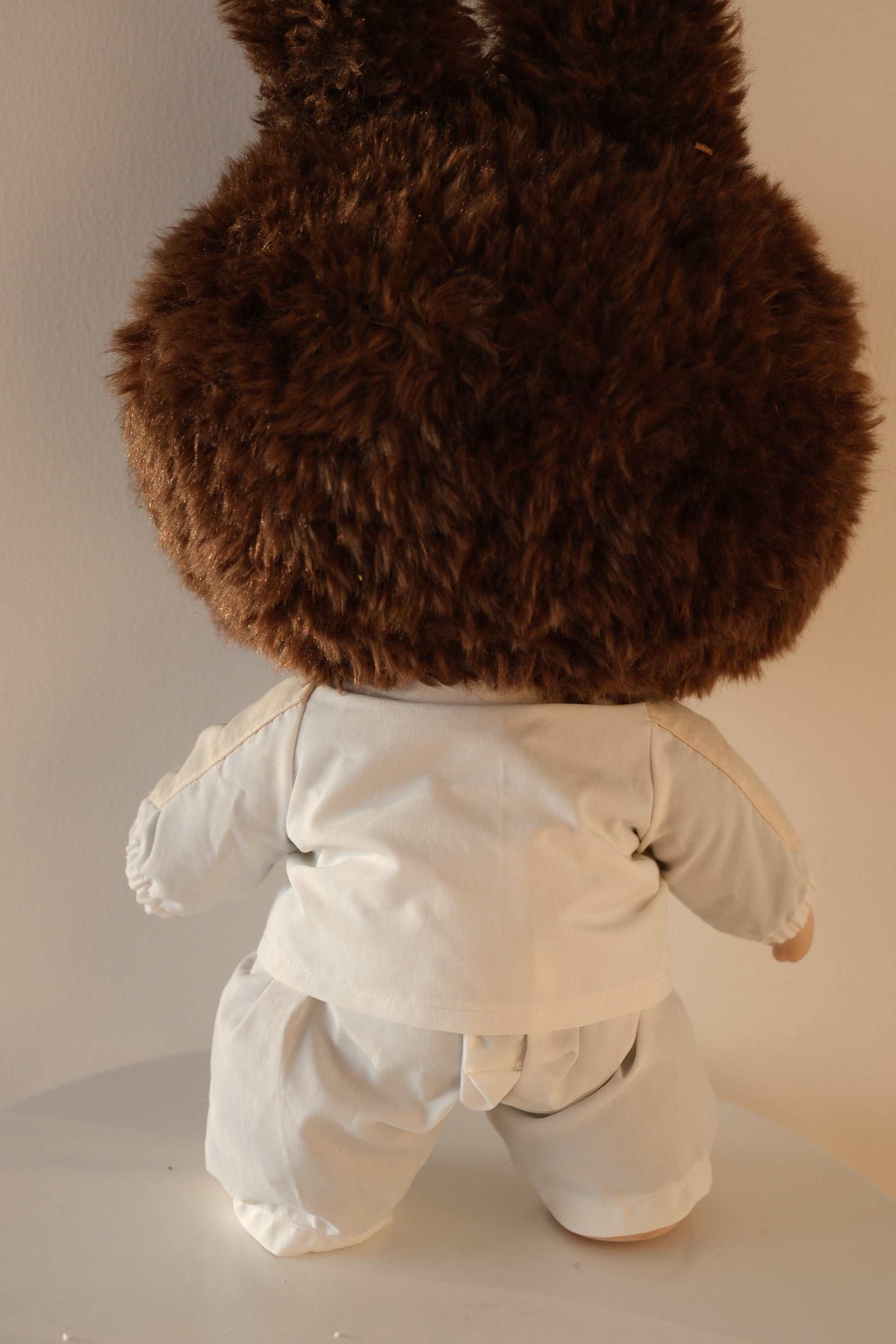 Back view of 38cm Labubu in the Bejeweled set, highlighting the fit of the sequin bomber jacket