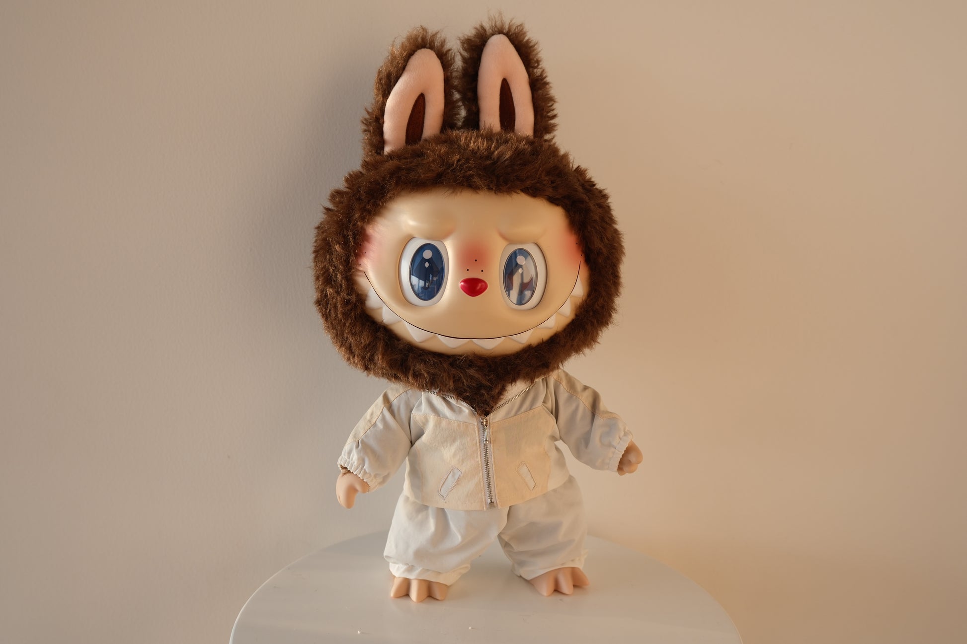 Front view of 38cm Labubu wearing a Taylor Swift inspired blue sequin jacket and pants set