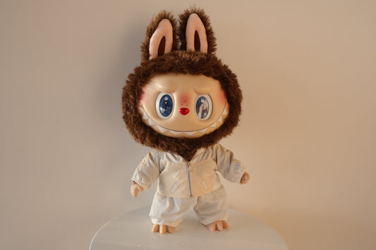 Front view of 38cm Labubu wearing a Taylor Swift inspired blue sequin jacket and pants set