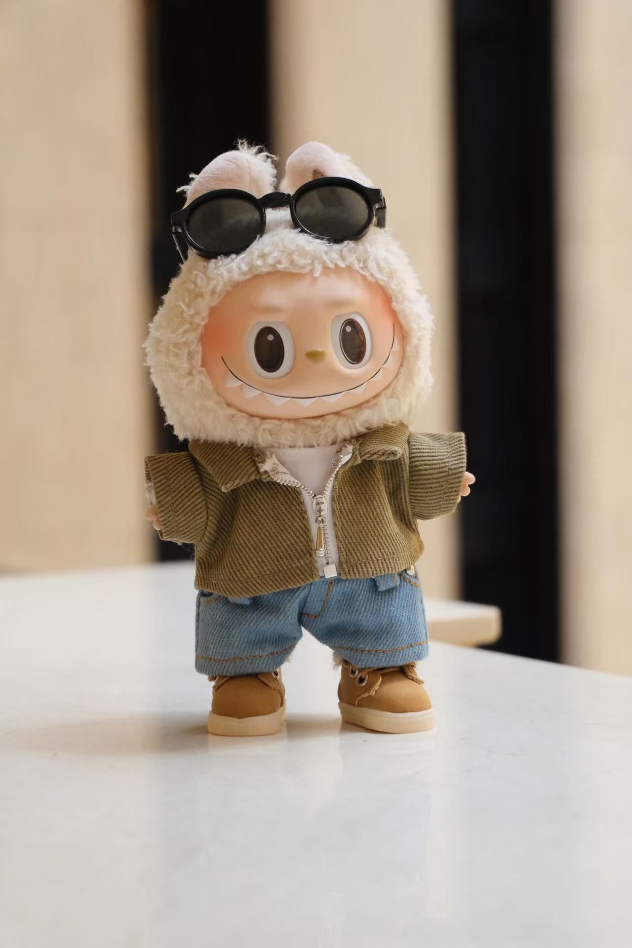 A collectible figure wearing a 5-piece denim street style outfit, including a jacket, T-shirt, jeans, shoes, and sunglasses.

