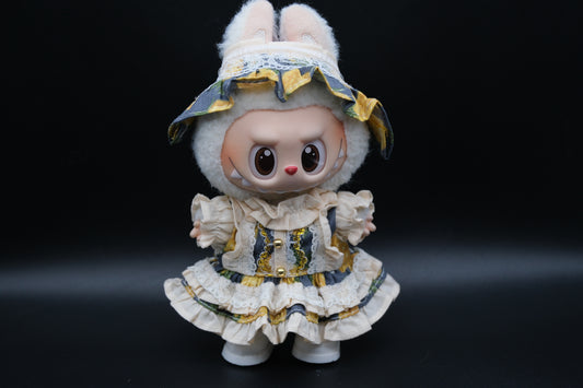 A labubu wearing a white tiered dress ，shoes and a bridal headband.
