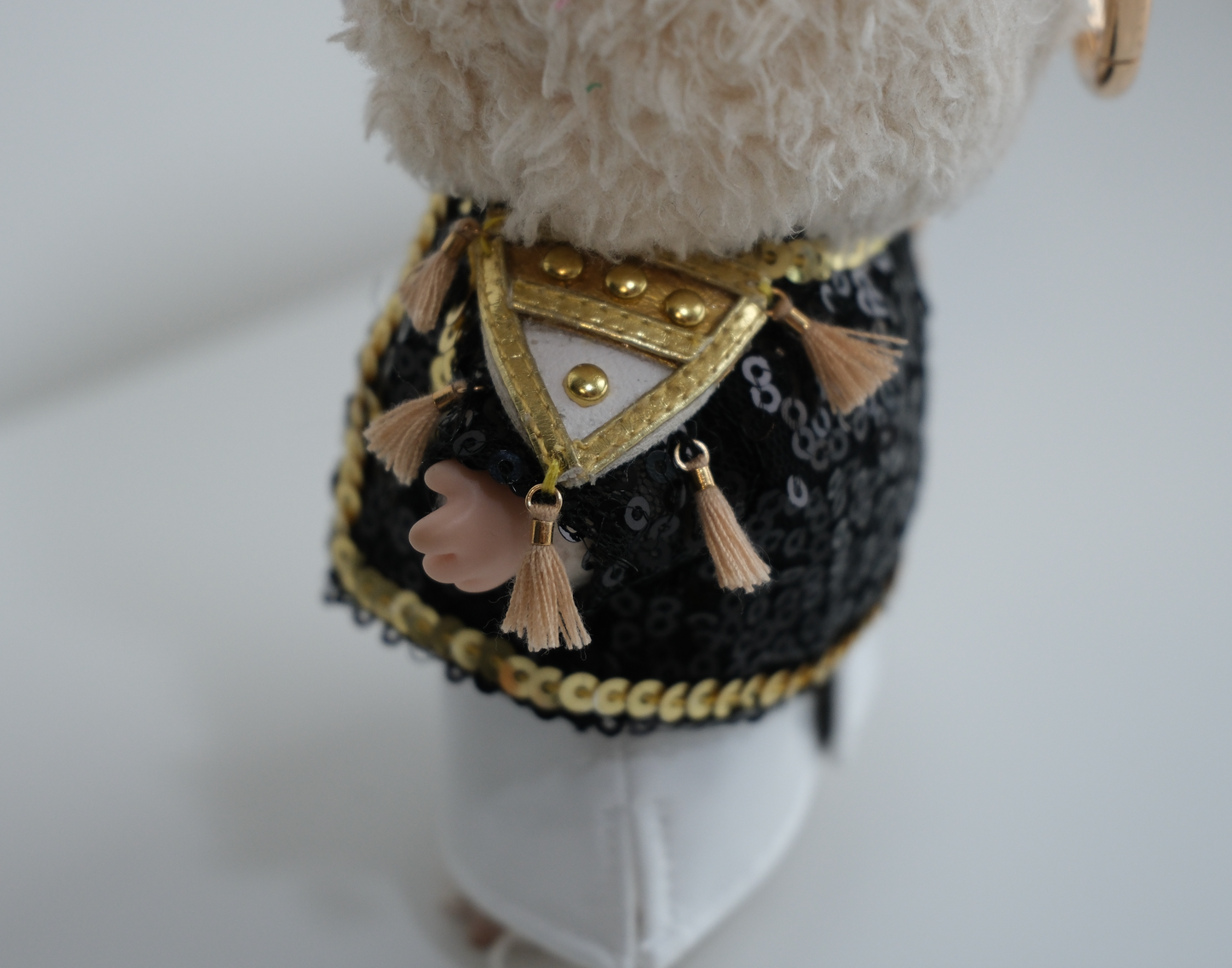 Kpop-Demon-Hunters-Golden-Mira-labubu outfit close up