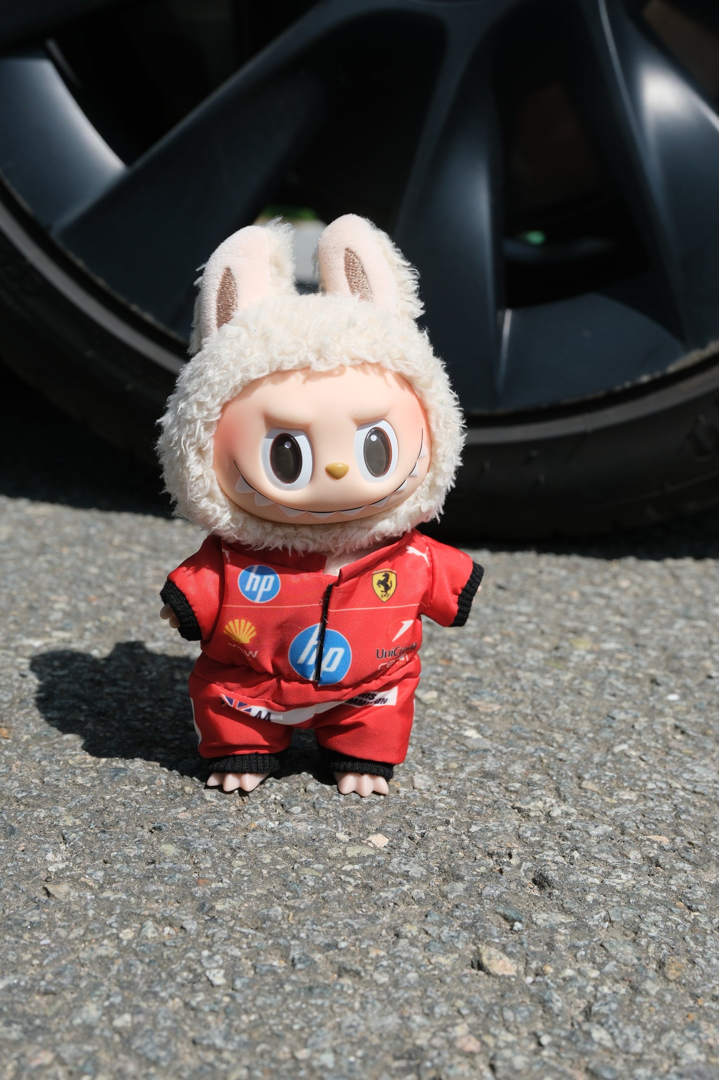 LABUBU dolls wearing handmade F1 team uniforms from Ferrari