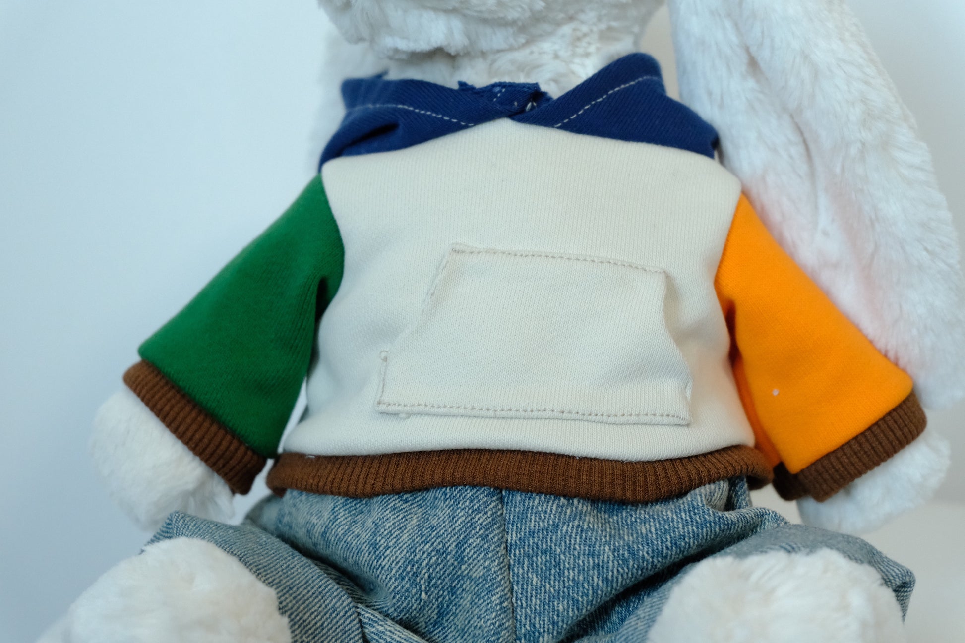 Close-up of the hoodie on a Jellycat Bunny showing how the ears fit comfortably through the hood.