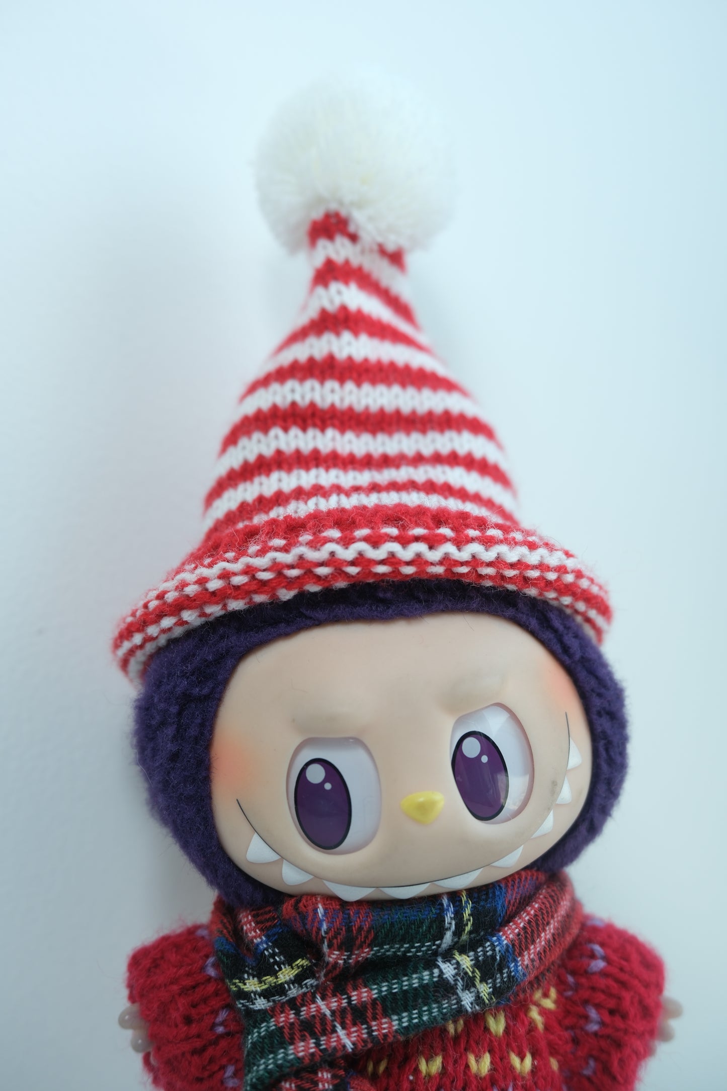 details of labubu-red-plaid-scarf-knitwear