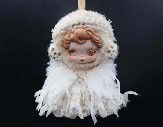 Full-body shot of a Skullpanda figure wearing a custom-made, white feather dress and a fluffy cap with lace trim.