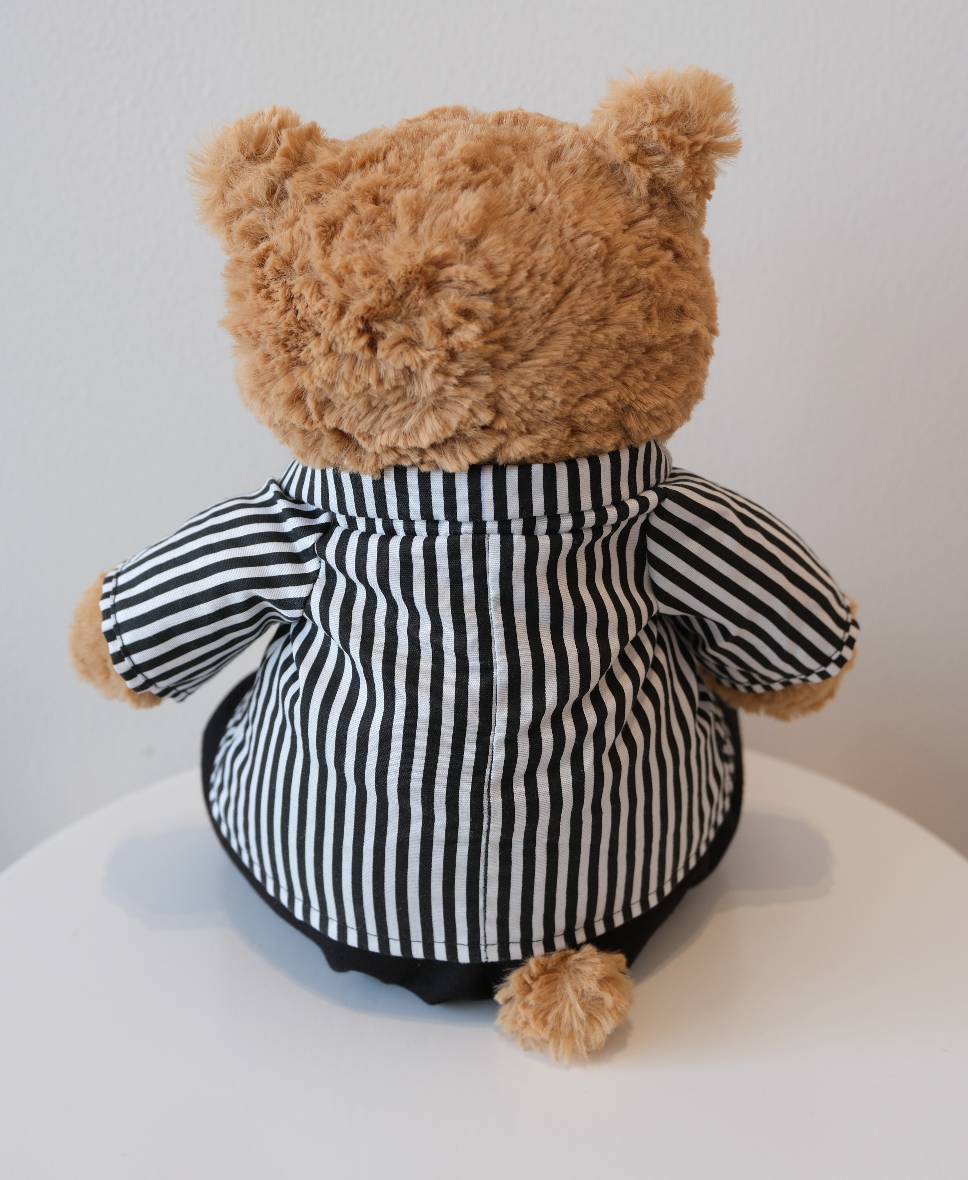 Close-up of the miniature collared shirt detail on a Jellycat Bartholomew Bear doll.