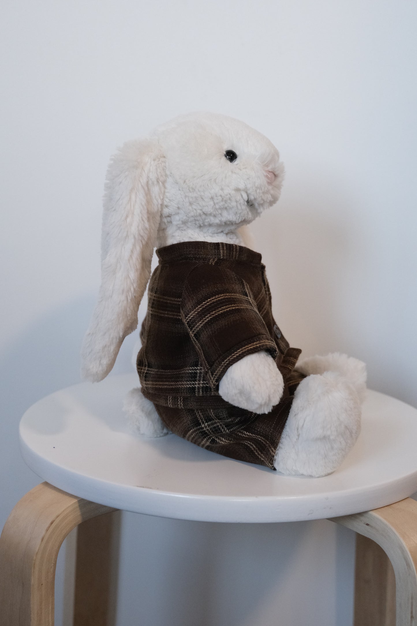 Side view of the tailored pants and jacket fit on a Medium Jellycat Bashful Bunny.