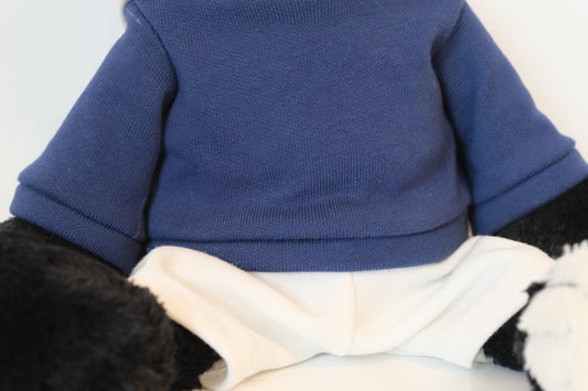 Close-up of the miniature urban blue hoodie fabric and quality stitching designed for Jellycat Jack