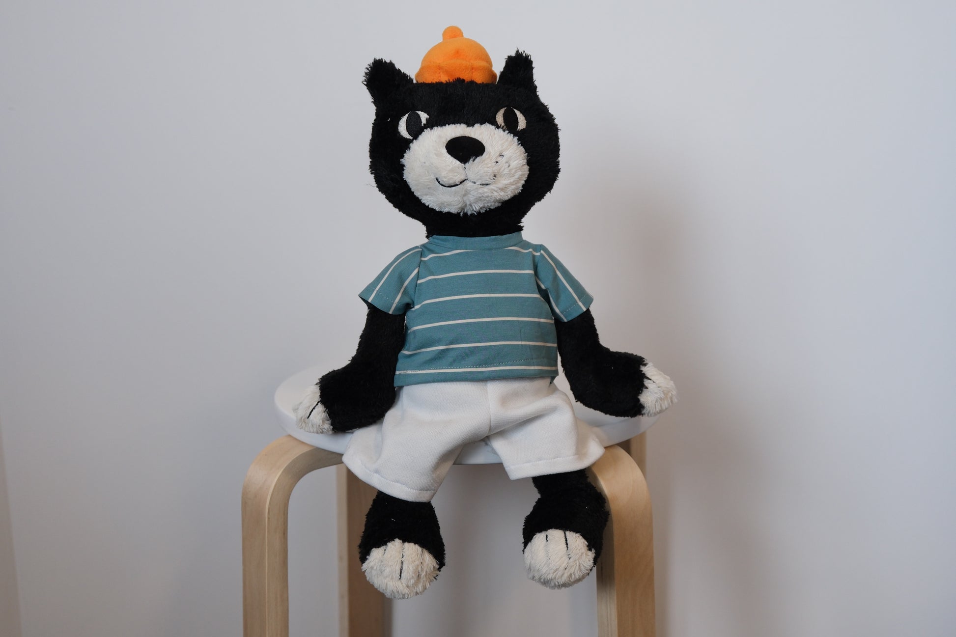 jellycat jack  cat with a striped shirt and white pants