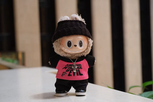 A Labubu figure wearing a 5-piece blackpink streetwear outfit, including a graphic T-shirt, headband, and a silver necklace.