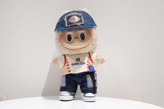 Labubu figure wearing a 4-piece workwear streetwear outfit with a denim baseball cap, "Sports Club" T-shirt, utility pants, and white sneakers