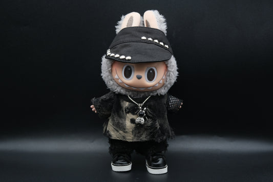  Labubu designer toy figure showcasing a modern streetwear look, featuring a punk hat , a black mixed dyeing distressed T-shirt, black pants and black sneakers and sliver necklace
