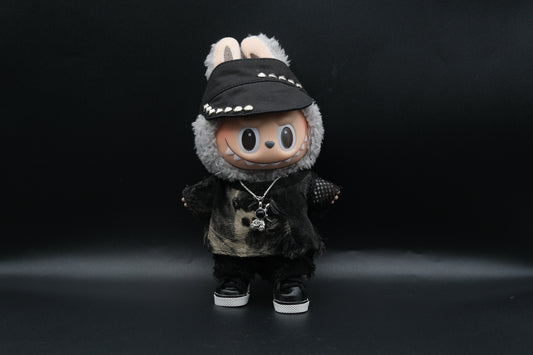  Labubu designer toy figure showcasing a modern streetwear look, featuring a punk hat , a black mixed dyeing distressed T-shirt, black pants and black sneakers and sliver necklace