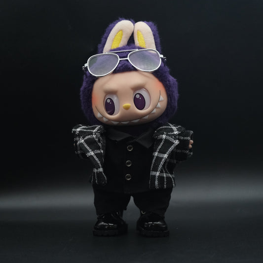 A Labubu figure wearing a 5-piece plaid jacket outfit, including a tailored plaid jacket and black pants.