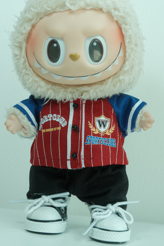 Close-up of The labubu figure's short-sleeve plaid shirt and  pants