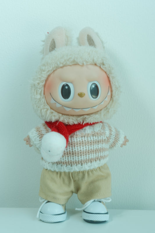 Labubu figure wearing a 4-piece knitwear outfit with winter or Christmas sweater, scarf, pants and shoes