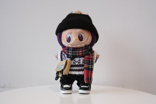 Labubu figure wearing a 6-piece winter streetwear outfit, including a striped knit sweater and black beanie
