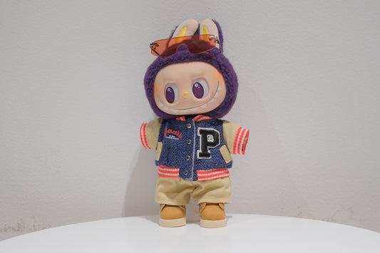 Labubu figure wearing a 4-piece varsity streetwear outfit with a baseball jacket (P-patch), sporty sunglasses, khaki shorts, and boots.