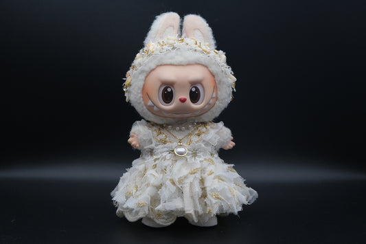 Labubu figure wearing a 3-piece white frill dress, necklace, and shoes, representing the Coquette or Angel Core aesthetic