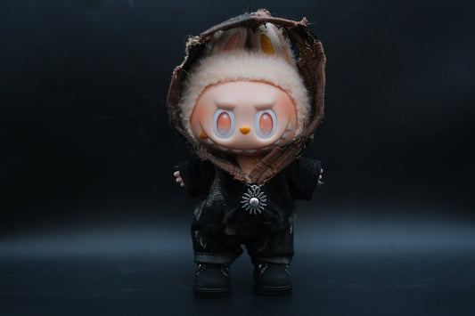 LABUBU plush doll wearing a distressed black hoodie and a silver sun pendant necklace