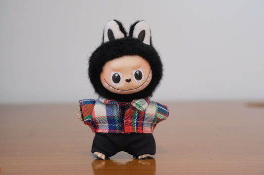 Labubu figure wearing a 2-piece plaid shirt and black pants outfit