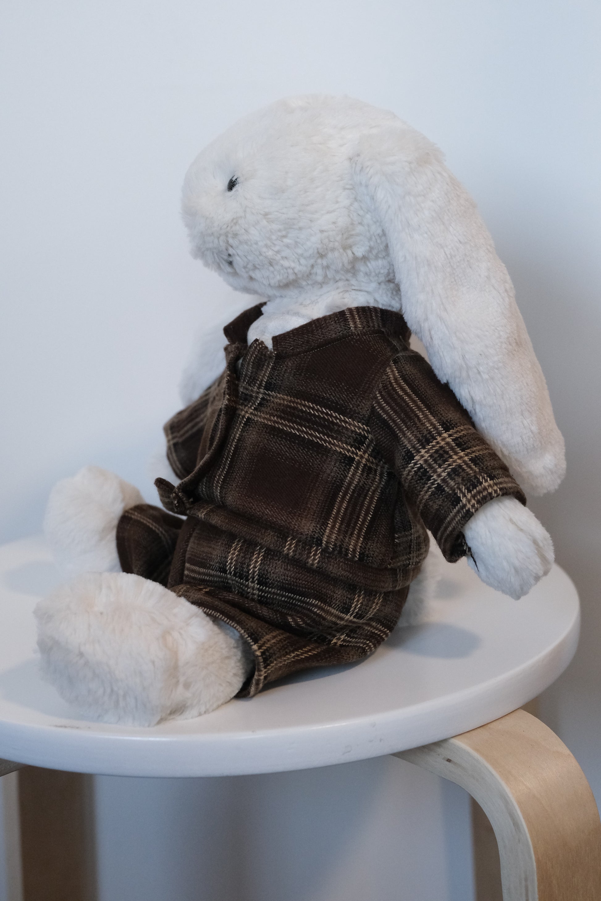 Side view of the tailored pants and jacket fit on a Medium Jellycat Bashful Bunny.