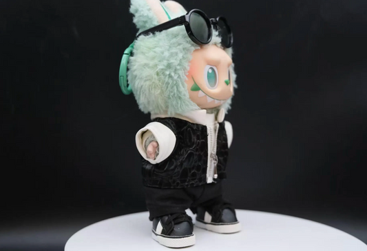 LABUBU plush doll wearing a textured black and white zipper jacket with round glasses