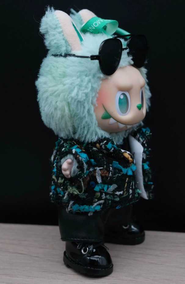 LABUBU plush doll wearing a handmade black tweed jacket with blue and green threads